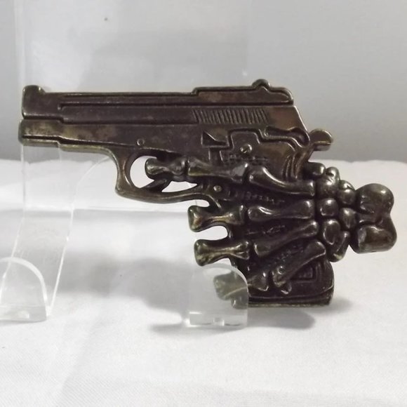 Distressed Pistol in a Skeleton Hand Novelty Belt Buckle - Picture 1 of 9